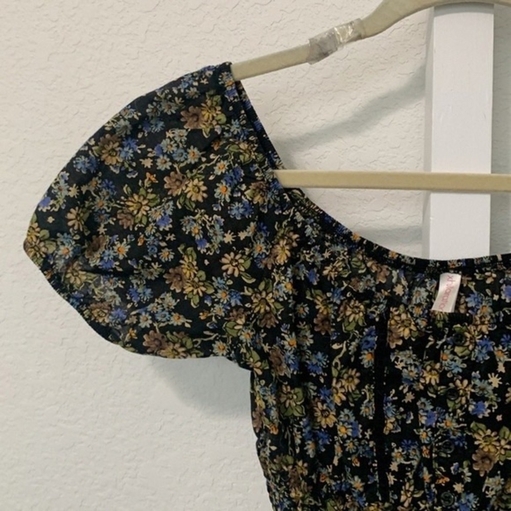 Xhilaration Black Floral Top with Blue and Yellow Accents
